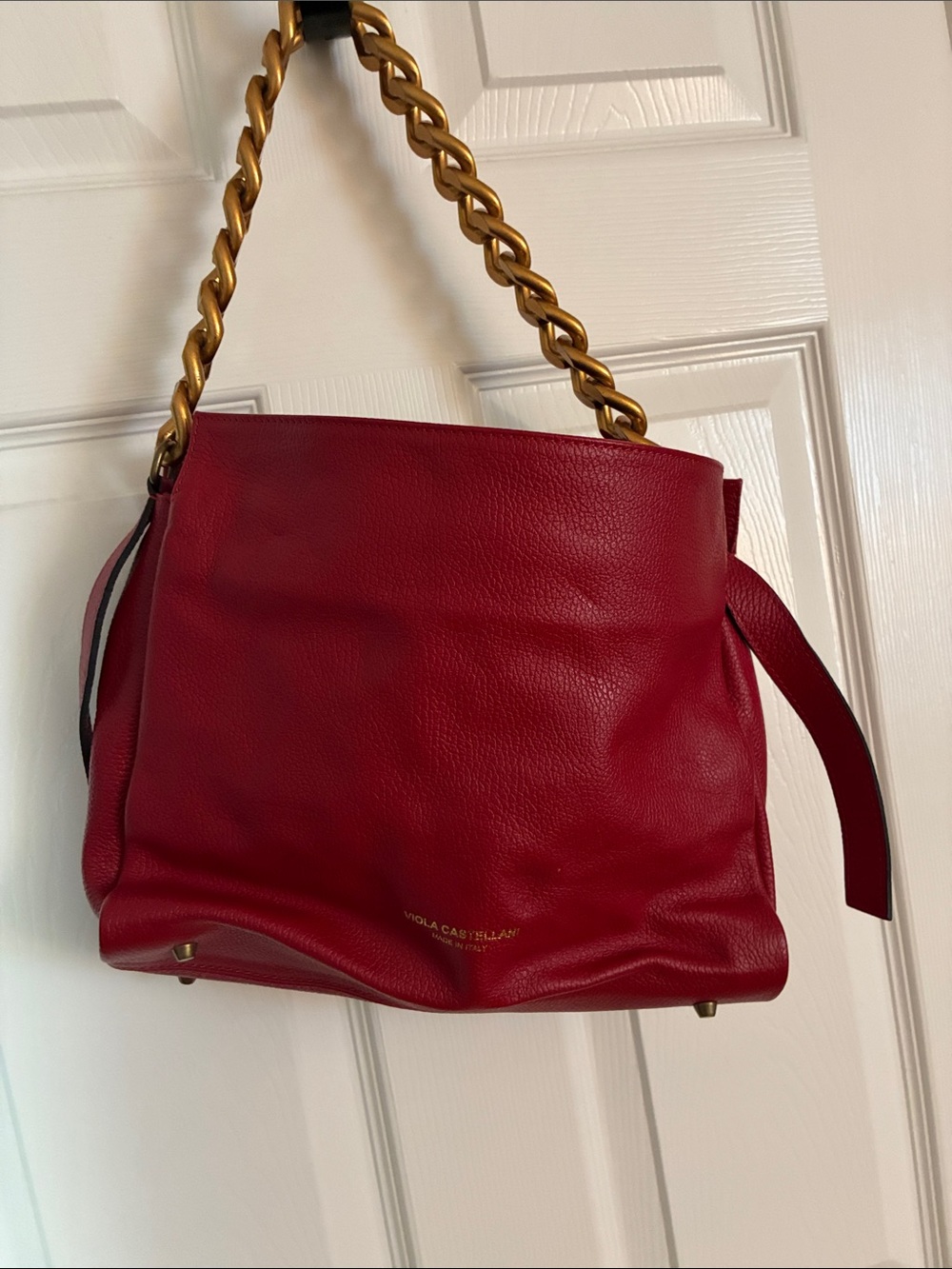 Viola Castellani red leather handbag.